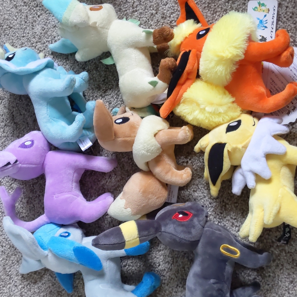 Eevee and evolutions Pokemon plushies, set of 8.